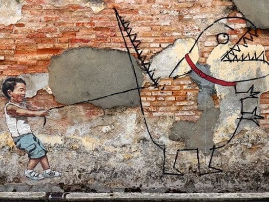 Little Boy with Pet Dinosaur mural on Lebuh Ah Quee, a painted boy holding a rope leash tied around a T-rex