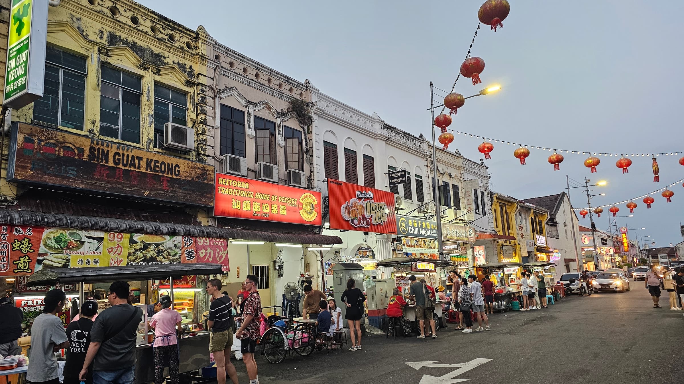 Evening crowd and hawker stalls at the Kimberley Street food market in George Town